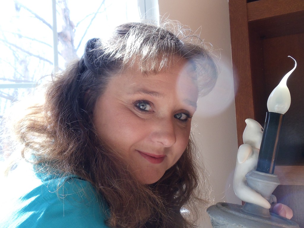 Courtney Mroch with ghost lamp and orb