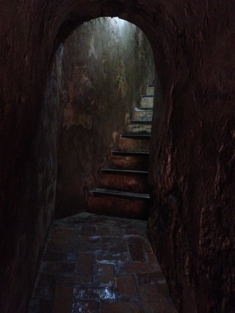 An intriguing passageway with a staircase to explore.