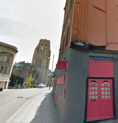  The red doors lead to what used to be the Triangle Club. The proximity of the University tower is still clearly  visible.