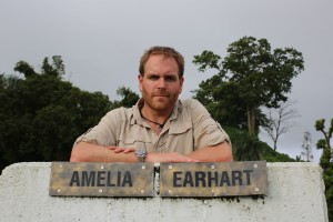 Josh Gates on the Lae Runway in Papua New Guinea, the last location Amelia-Earhart took off from before her disappearance