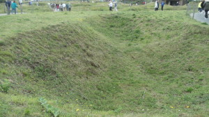 One of the craters at Pointe du Hoc created by bombs during World War II.