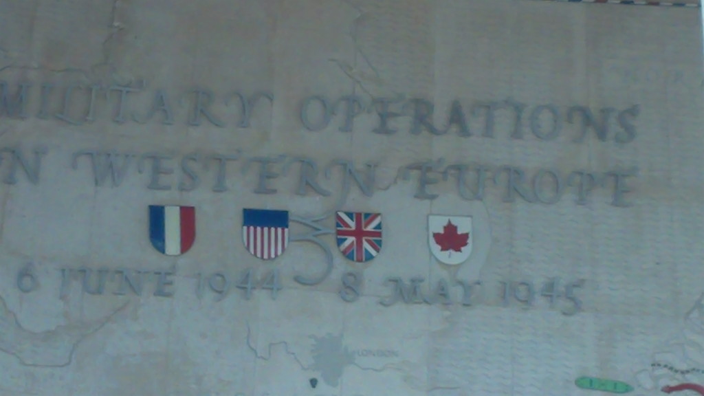 Flags on Normandy American Cemetery memorial