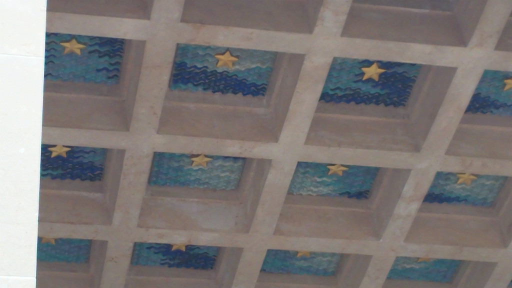 Stars on Normandy American Cemetery memorial ceiling .