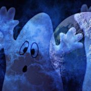 ghosts superimposed on cloudy full moon night background