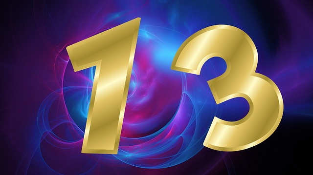 Gold number 13 on psychedelic background for Friday the 13th