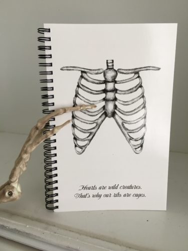 Notebook with rib cage on cover