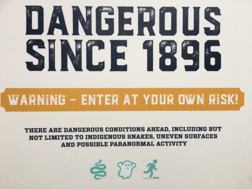 Close up of Dangerous Since 1896 Brishy Mountain Warning Sign