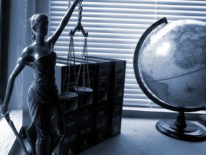 Lady justice with a globe