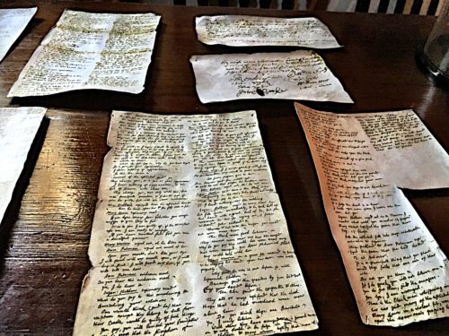 Salem Witch Trial documents on display in the Witch House