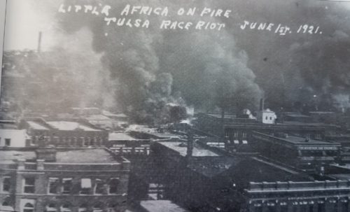 Photograph with handwritten message about Little Africa on fire from Tulsa Race Riot