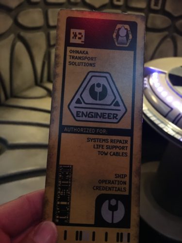 Yellow engineer card for Millennium Falcon: Smuggler's Run ride at Disneyland's Galaxy Edge