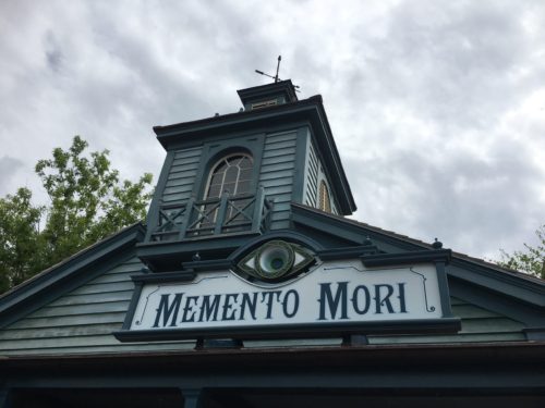 Memento Mori sign above the shop in Disney's Magic Kingdom