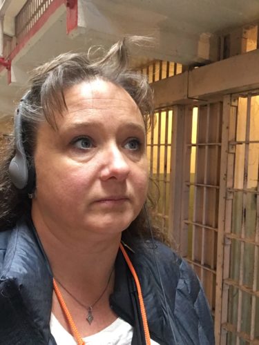Courtney Mroch taking the audio tour of Alcatraz