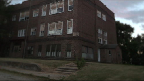 Exterior from ground up shot of Farrar Schoolhouse