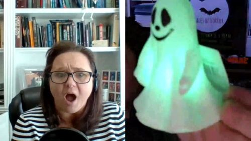 Courtney Mroch shocked at light up ghost in Emerian Rich's Ghoulish Goodies gothic mystery box