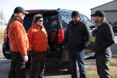 Jason Hawes and Steve Gonsalves meet with cadaver dog handlers.
