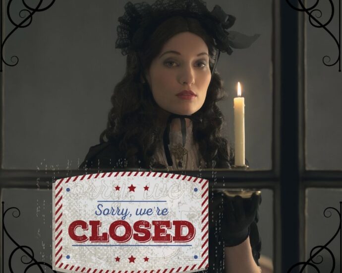 Sara Winchester looking lady with Winchester Mystery House closed again sign