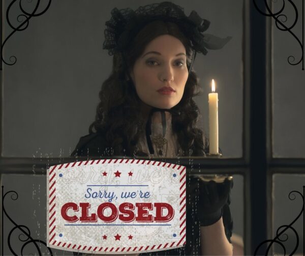 Sara Winchester looking lady with Winchester Mystery House closed again sign