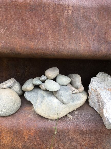 Group of inukshuks in wall along George Parks Highway 2