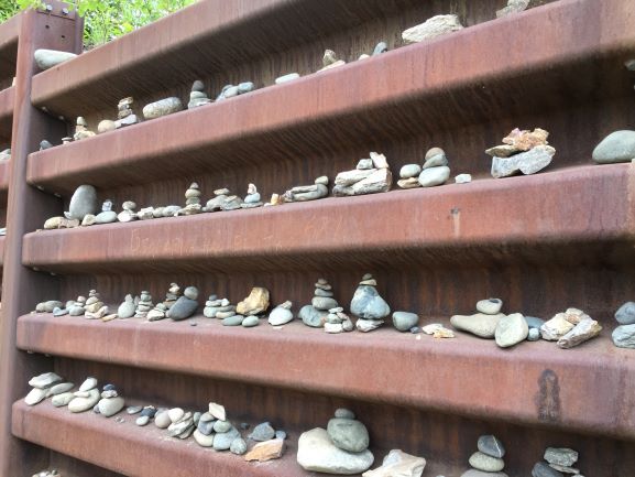 Inukshuks in path-side wall along George Parks Highway 2