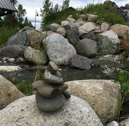Inukshuk at rock creek at Mt. McKinley Wilderness Lodge