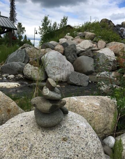 Inukshuk at rock creek at Mt. McKinley Wilderness Lodge