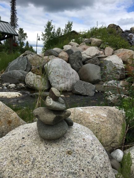 Inukshuk at rock creek at Mt. McKinley Wilderness Lodge