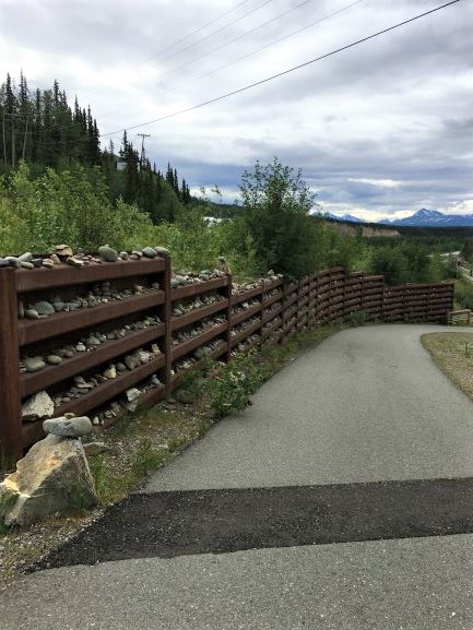 Pathway with inukshuks in wall at Denali