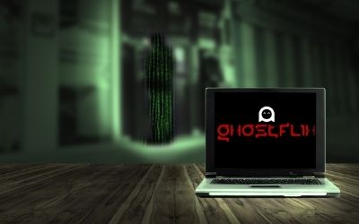 Ghostflix logo on creepy laptop background