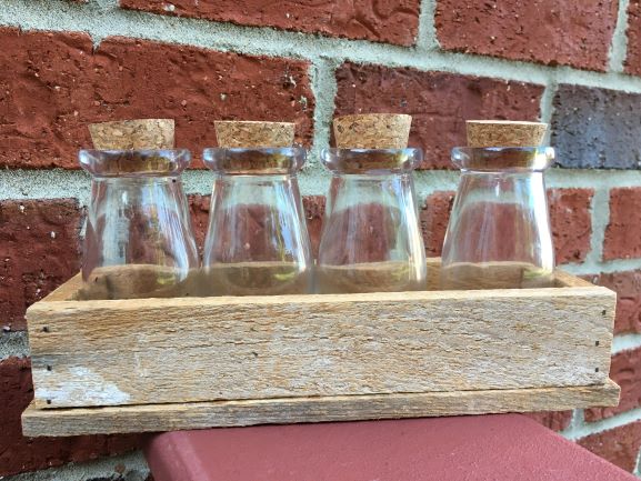 American Hauntings Ink Teas bottles in handmade wood box