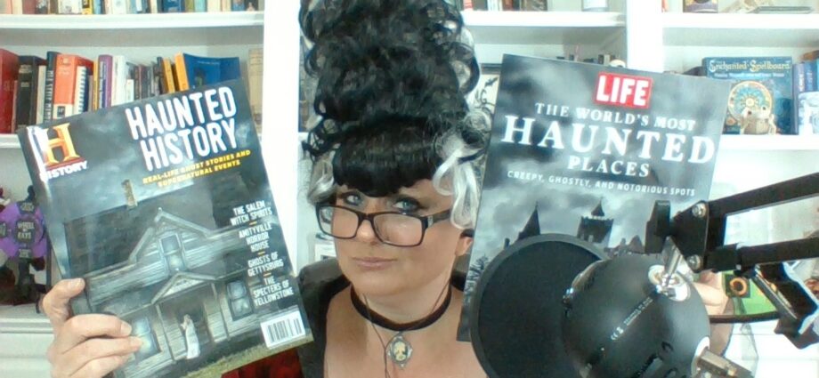 Courtney Mroch in Halloween costume holding up two magazines about ghosts, haunted places and the paranormal