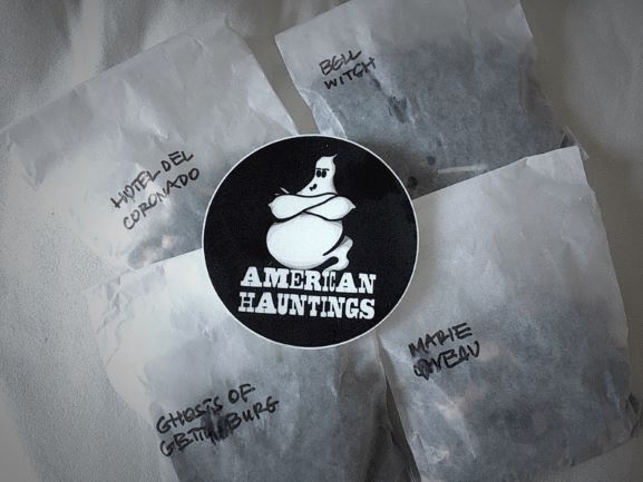 American Hauntings sticker on top of teas