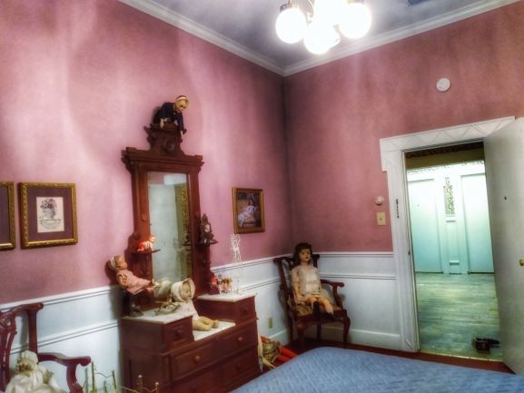 Historic Jefferson Hotel room with creepy dolls