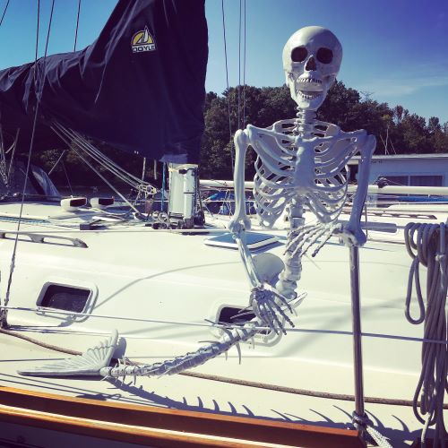 Mermaid skeleton on a sailboat