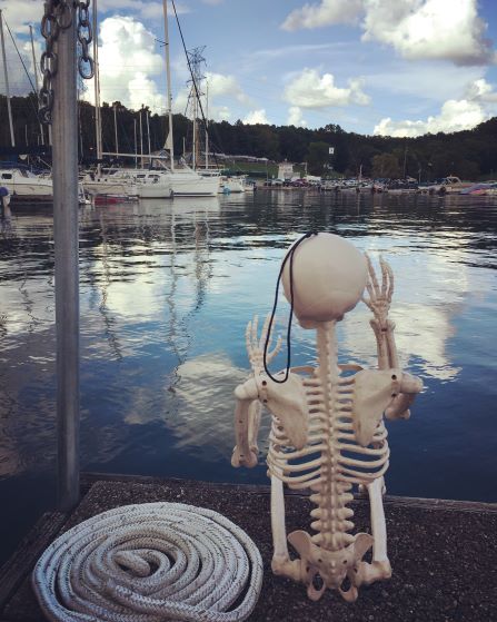 Smalls skeleton sitting on the dock