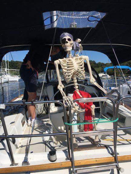 Pirate skeleton on a sailboat