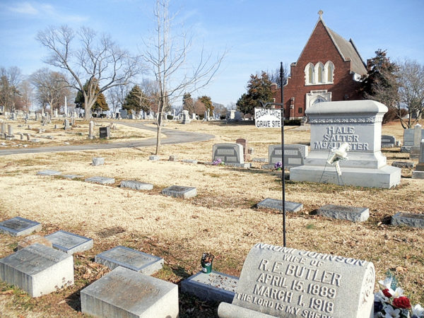 Edgar Cayce gravesite sign with church in background