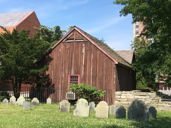 The Burying Point headstones and old house