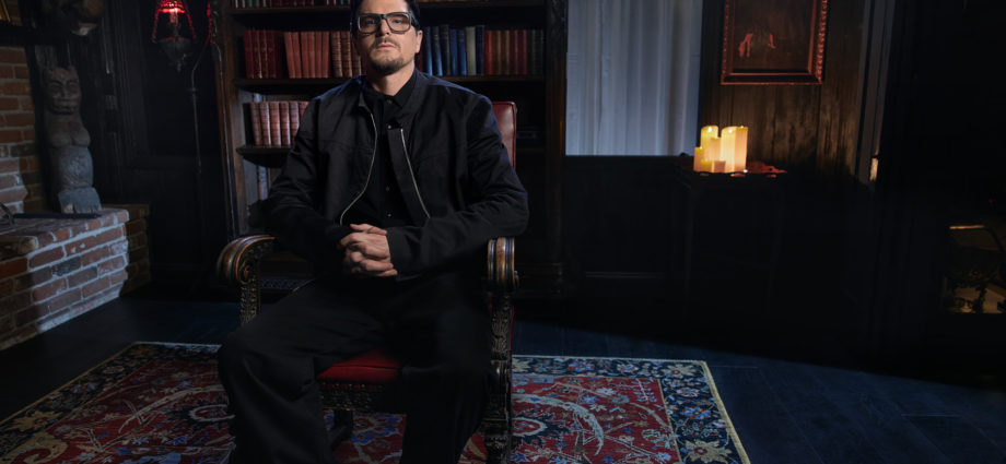 Zak Bagans in chair in room of Haunted Museum