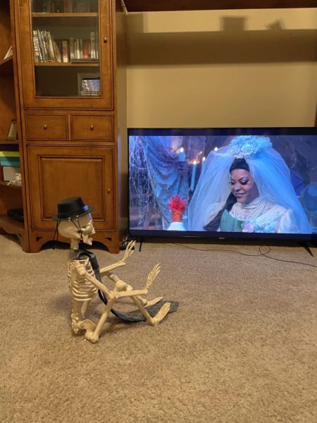 Skeleton watching Pepe and the Bride get married in Muppets Haunted Mansion