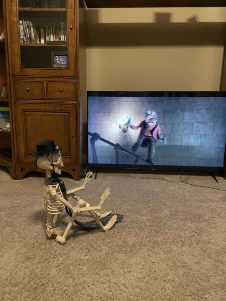 Skeleton watching the Great Gonzo on the stairs to save Pepe in Muppets Haunted Mansion
