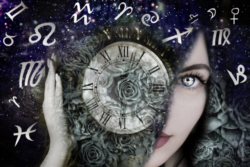 Woman with zodiac signs from a horoscope and clock