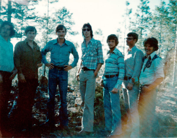 Archival photo of Travis Walton and the logging crew at the abduction site