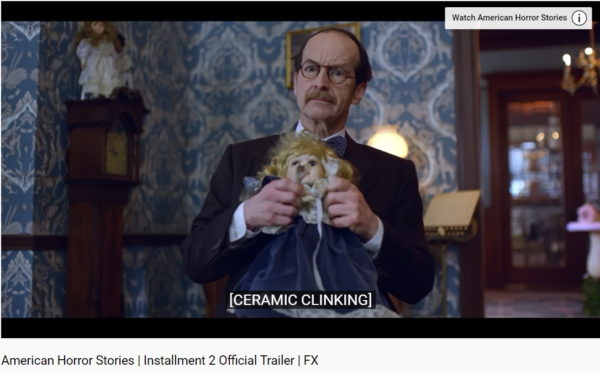 Denis O'Hare with doll in American Horror Stories season 2 trailer