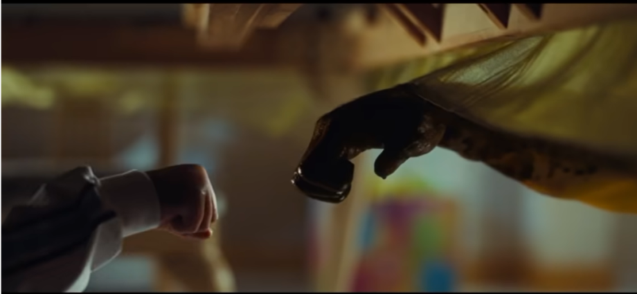 Gordy bloody exploding fist bump screenshpot from Nope Super Bowl Trailer