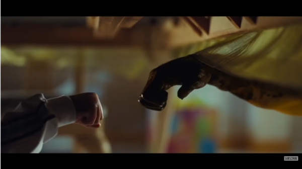 Gordy bloody exploding fist bump screenshpot from Nope Super Bowl Trailer