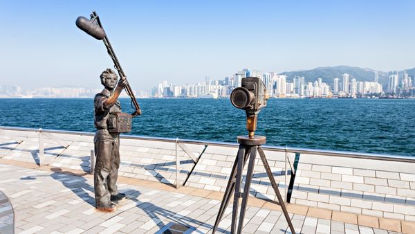 Movie making statue on Hong Kong harbor waterfront