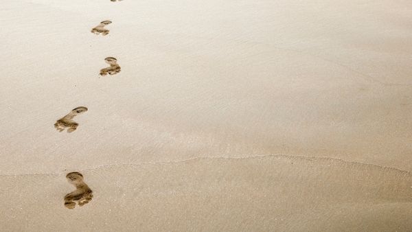 Ghost-like footprints in the sand