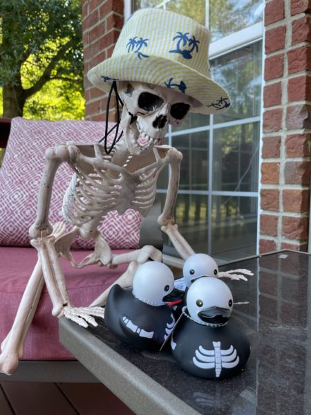Smalls Skeleton in his cruise fedora with rubber ducks