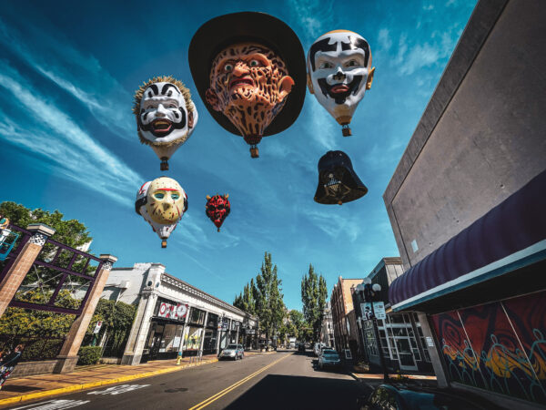 Freddy, Jason, the Insane Clown Posse, Darth Vader horror hot air balloons floating over a street